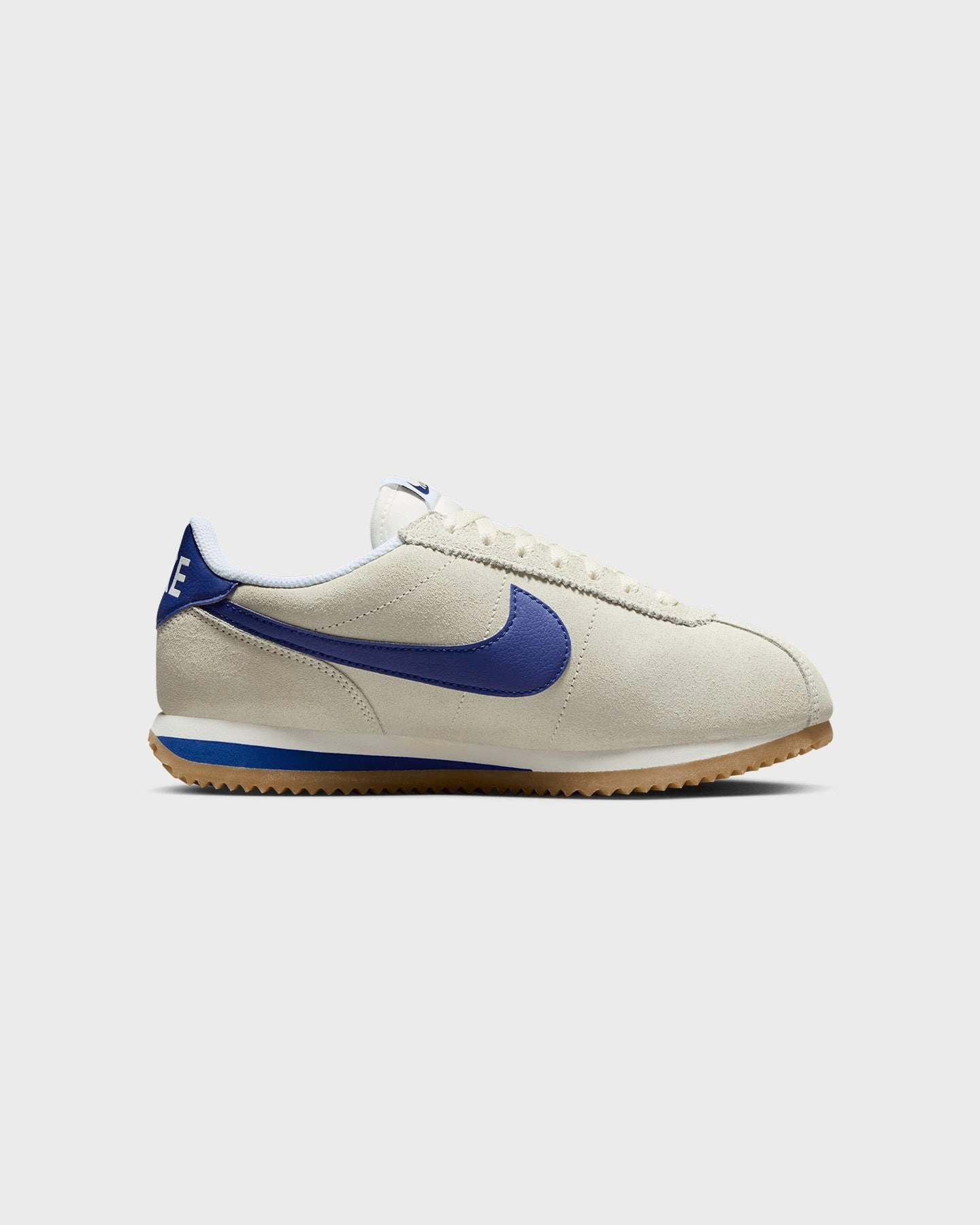 Lace Up Lockdown Mechanism perforated upper Nike Women's Cortez NCPS "Athletic Department" Pale Ivory/Deep Royal Blue