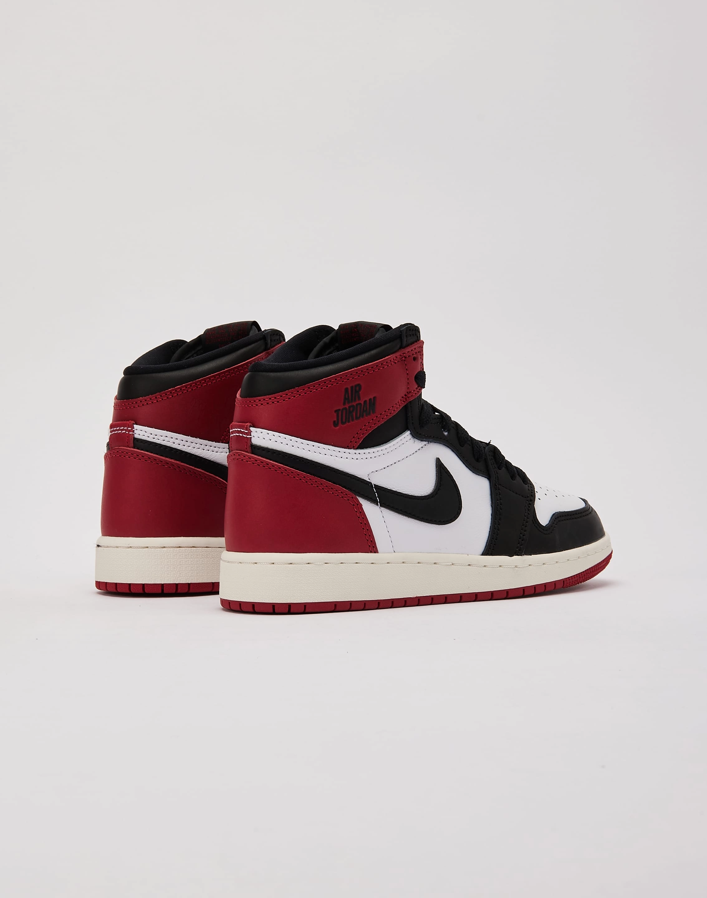 Jordan Air Jordan 1 Retro High OG 'Black Toe Reimagined' Grade-School Pure Motion