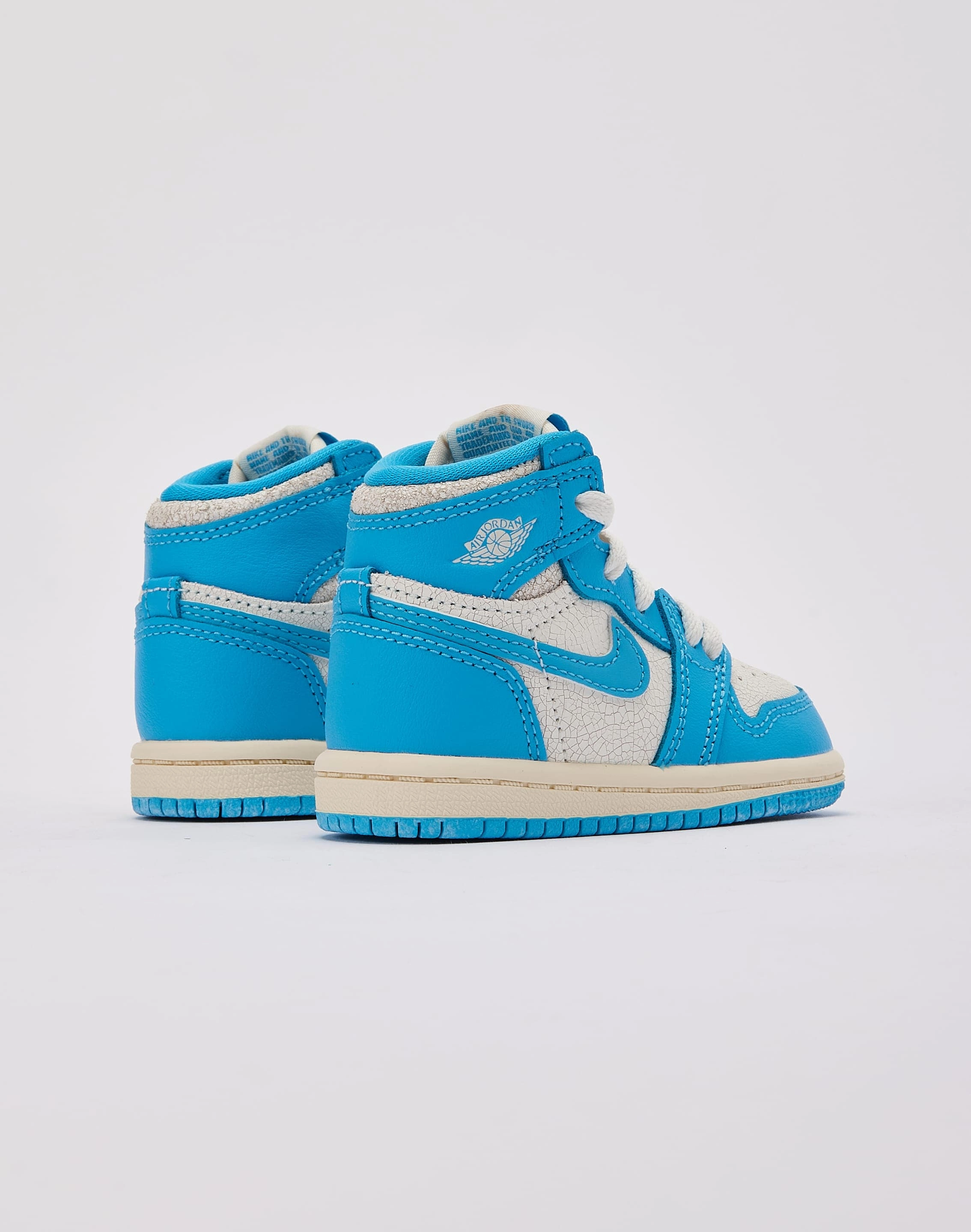 Jordan Air Jordan 1 Retro High OG 'UNC Reimagined' Toddler Cutting Zone Motion